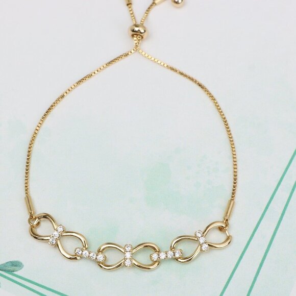 Elegant Rose Gold Infinity Bracelet in Cubic Zirconia, Adjustable Size, XPAB0606 - Picture 1 of 11